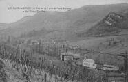 ouvrir dans la visionneuse : Légende inscrite sur la carte postale : 278. VAUX-en-BUGEY. - Vue de la Vallée de Vaux Fernous et des Usines Escoffier