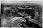 1 vue Légende inscrite sur la carte postale : Génissiat-route des usines et sortie du canal évacuateur 5 Fi 189-32